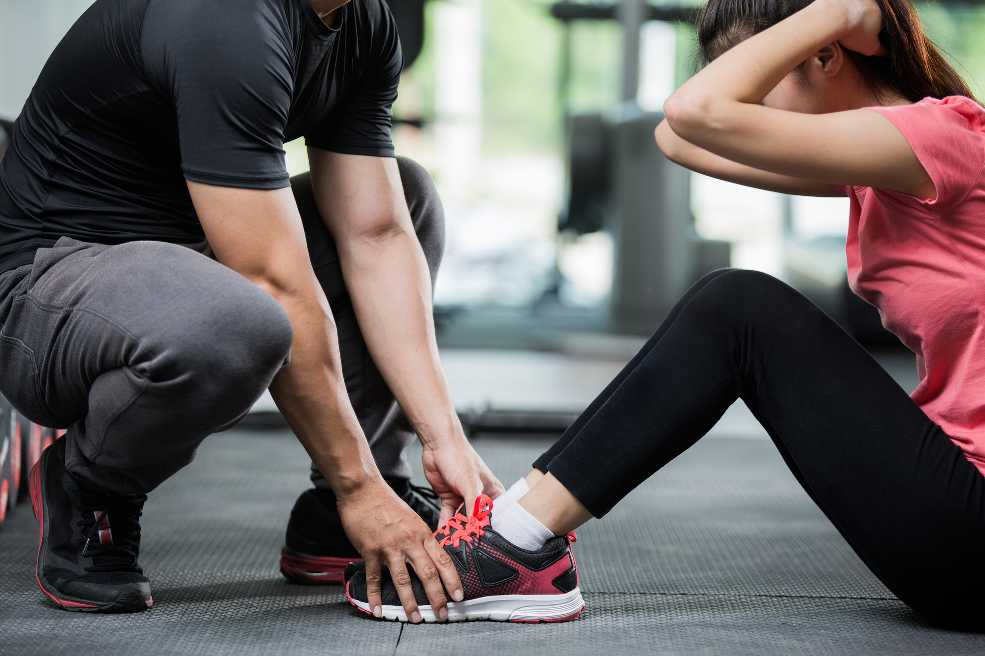 woman with personal trainer